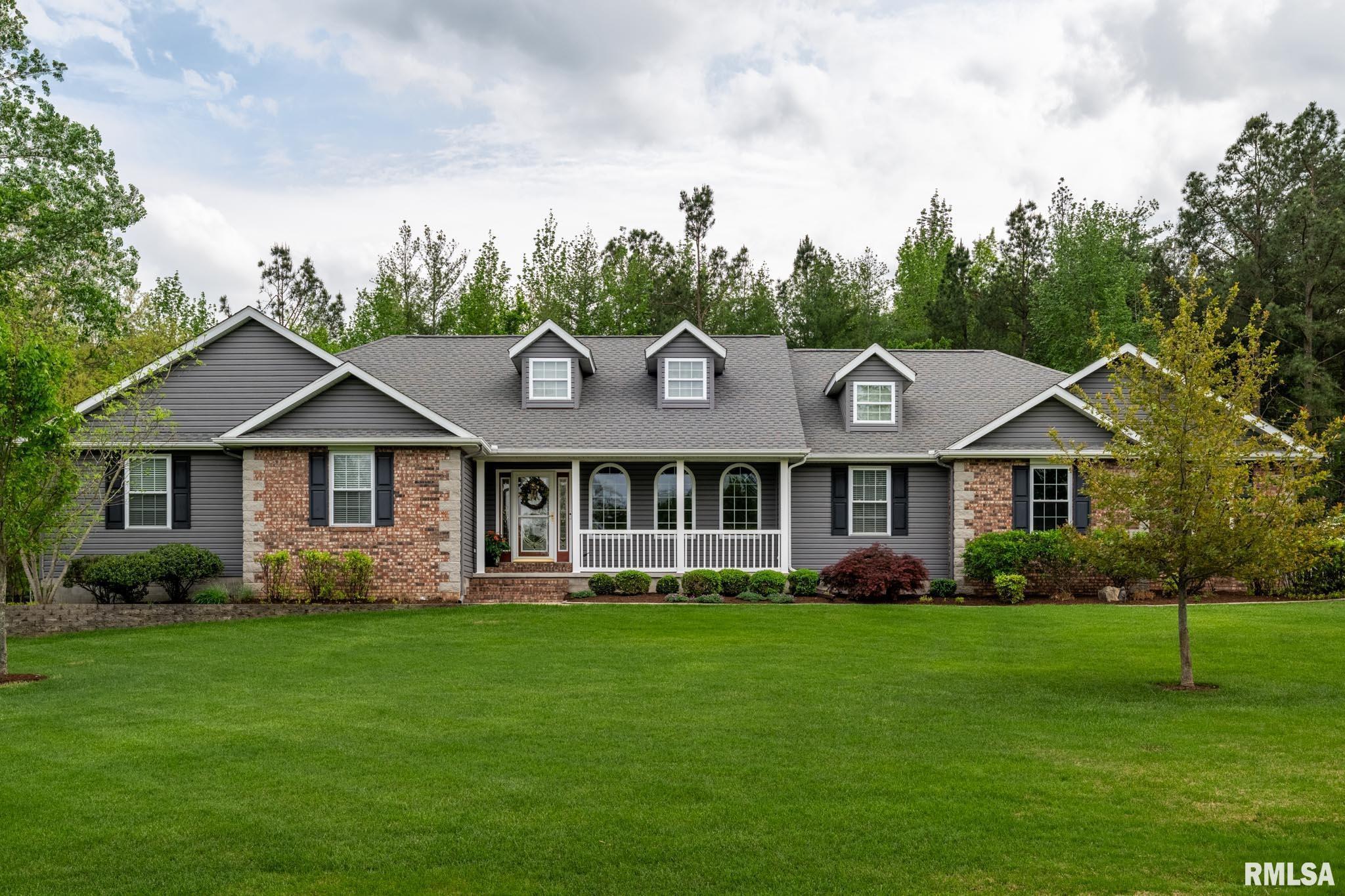 Luxury Home for sale at 301  ARBOR Drive  in Carterville Illinois!