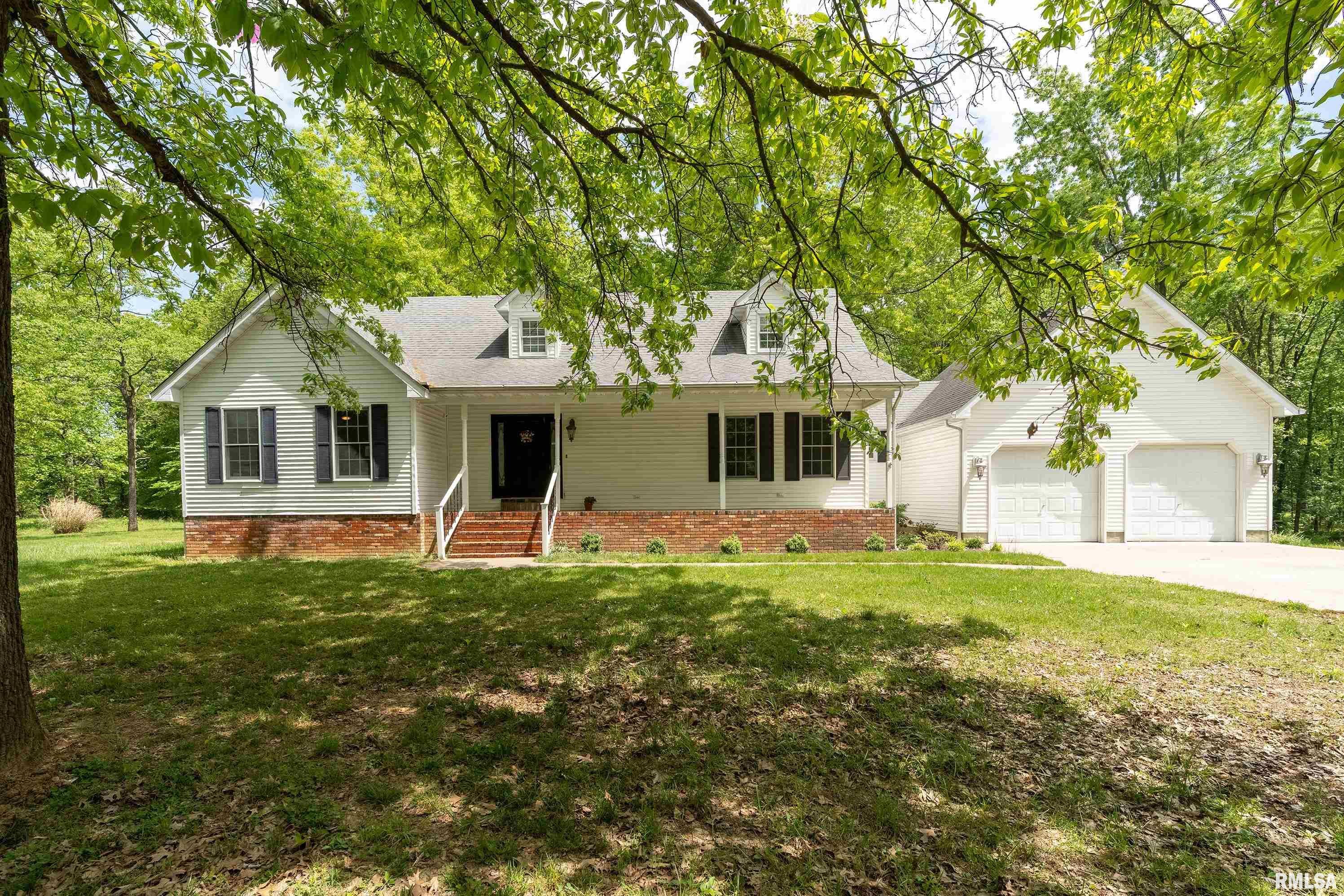 Luxury Home for sale at 200  Quail Run Drive  in Carterville Illinois!