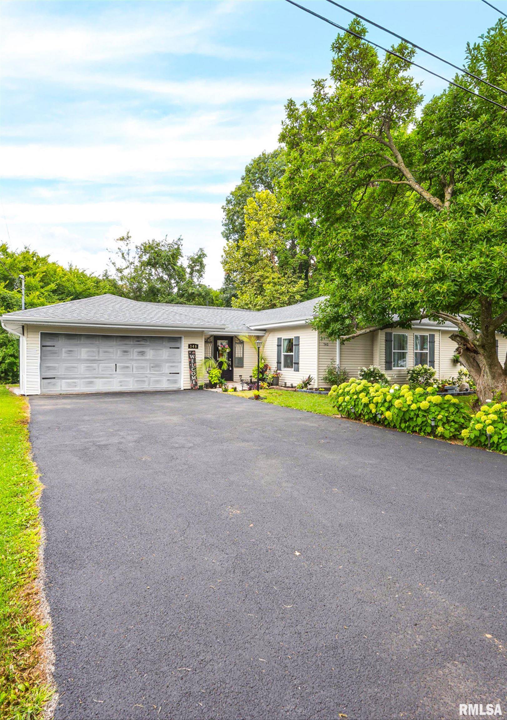Home for sale at 340  HAWTHORNE Circle  in Creve Coeur Illinois!