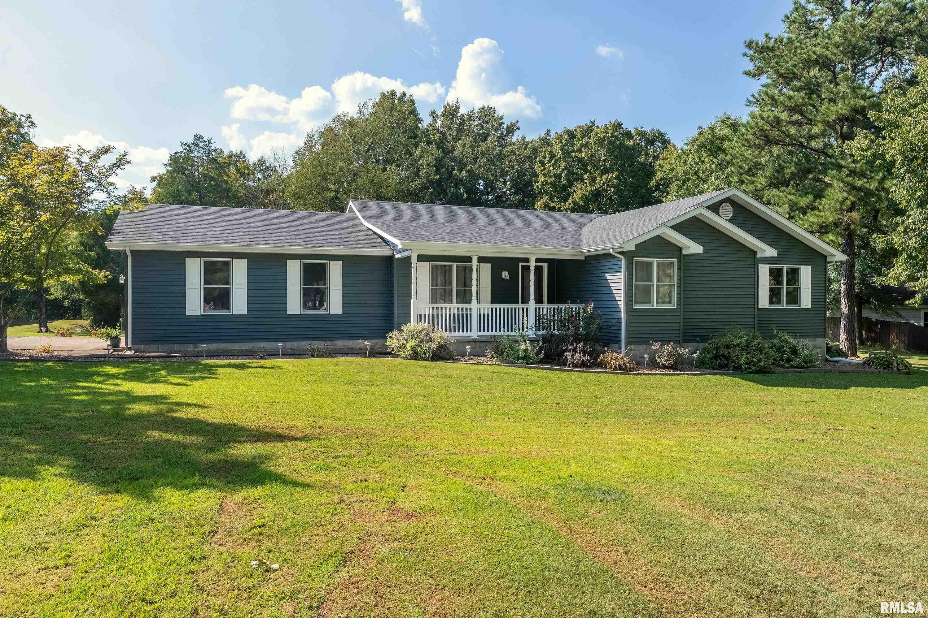 Home for sale at 1006  Sally Holler Road  in Harrisburg Illinois!